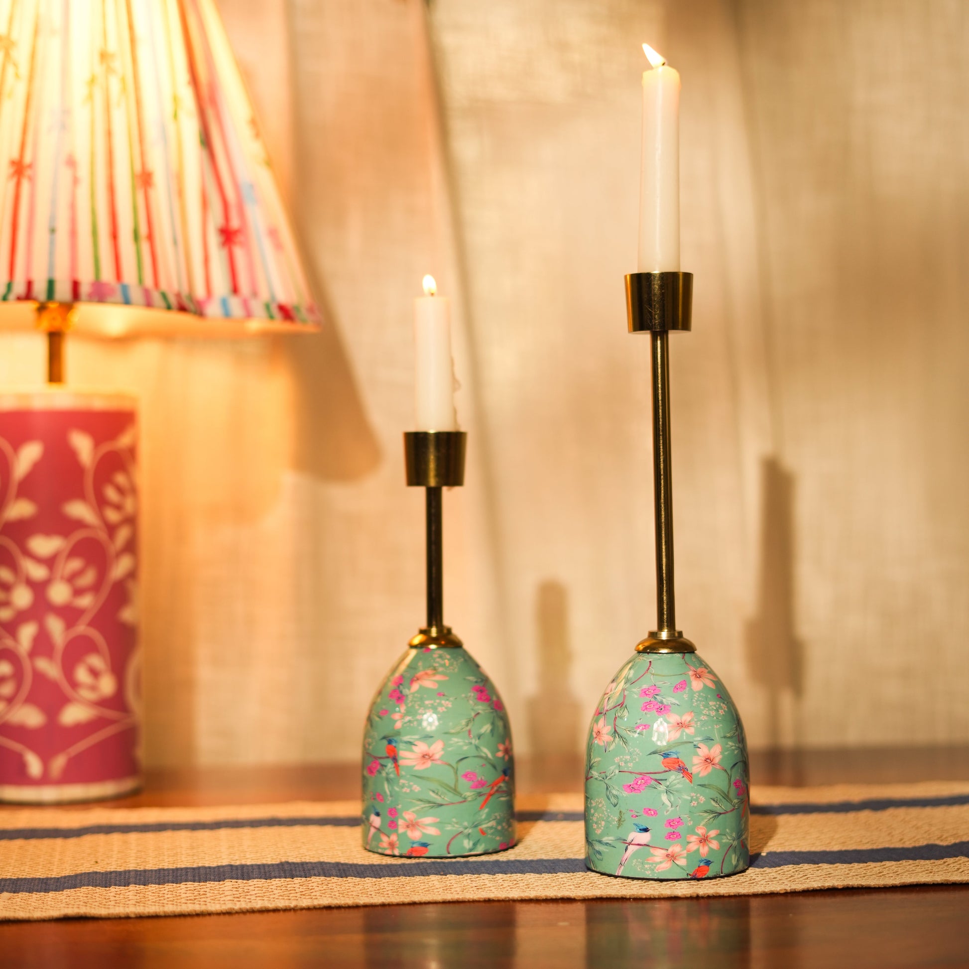Medium and large aqua floral candle stands displayed against a clean white background.