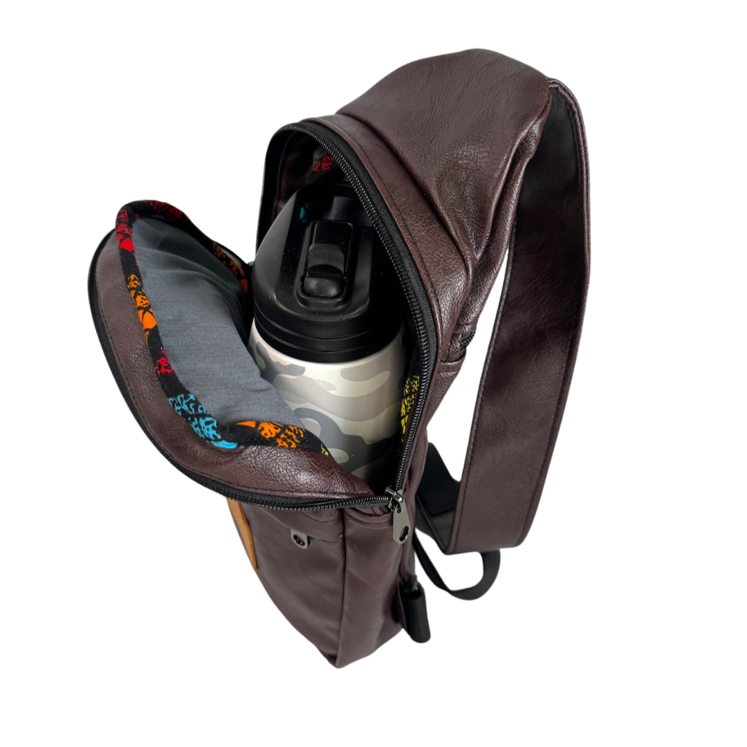 Umoja plum purple vegan leather sling bag flat lay #color_plum