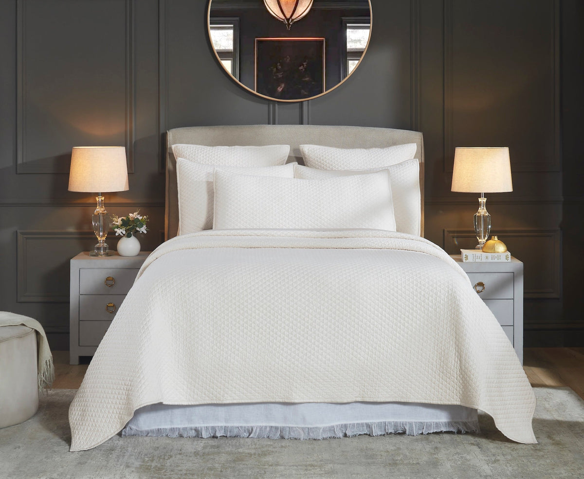 CL-265-9496_1|Elegant bedroom featuring a pristine white diamond quilted coverlet, matching pillows. Luxurious bedding for sophisticated home decor.