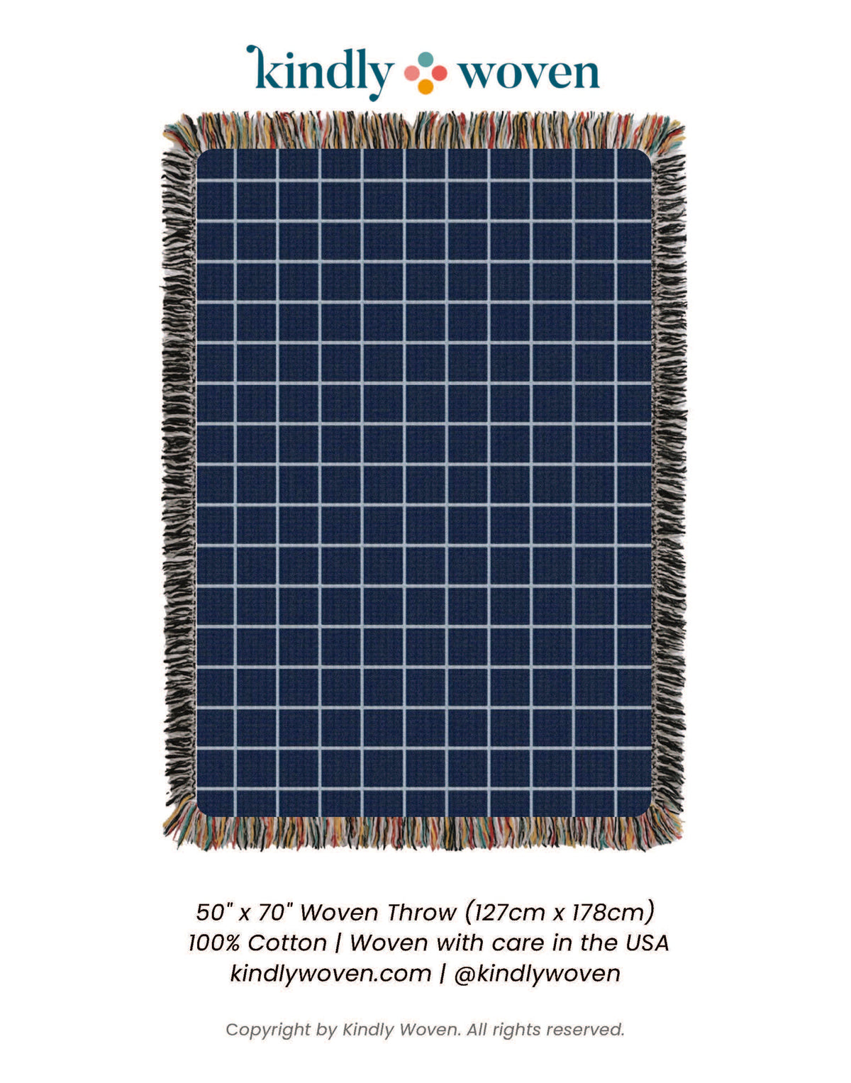 Full view of Greer Lapis blue grid reversible woven throw blanket with fringe