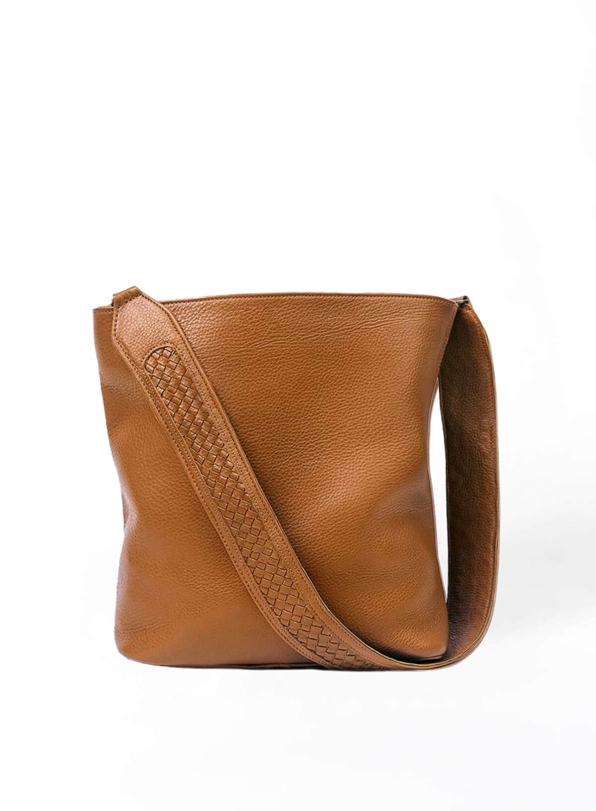 sarah shoulder bag from womens bags in honey held by model showcasing side view.