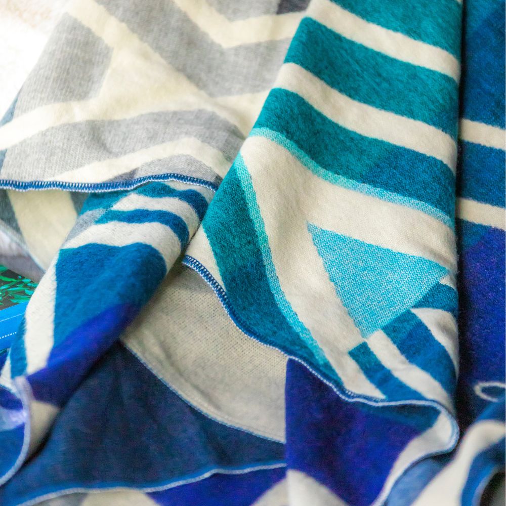 Blue handwoven throw with bold stripes