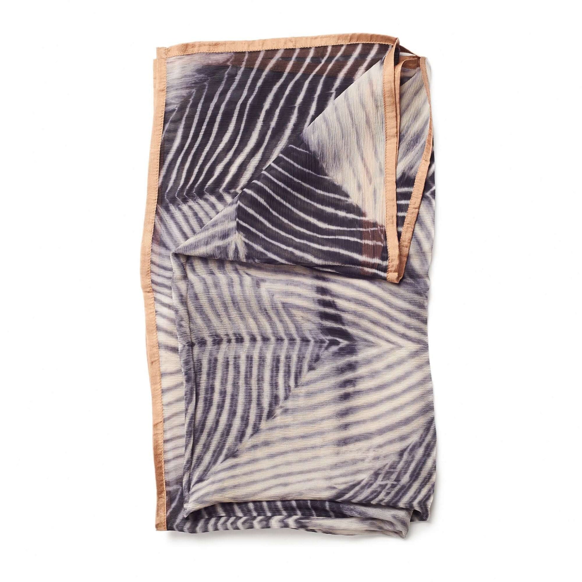 Samu Black hand crafted shibori print silk chiffon square scarf elegantly folded with modern design.