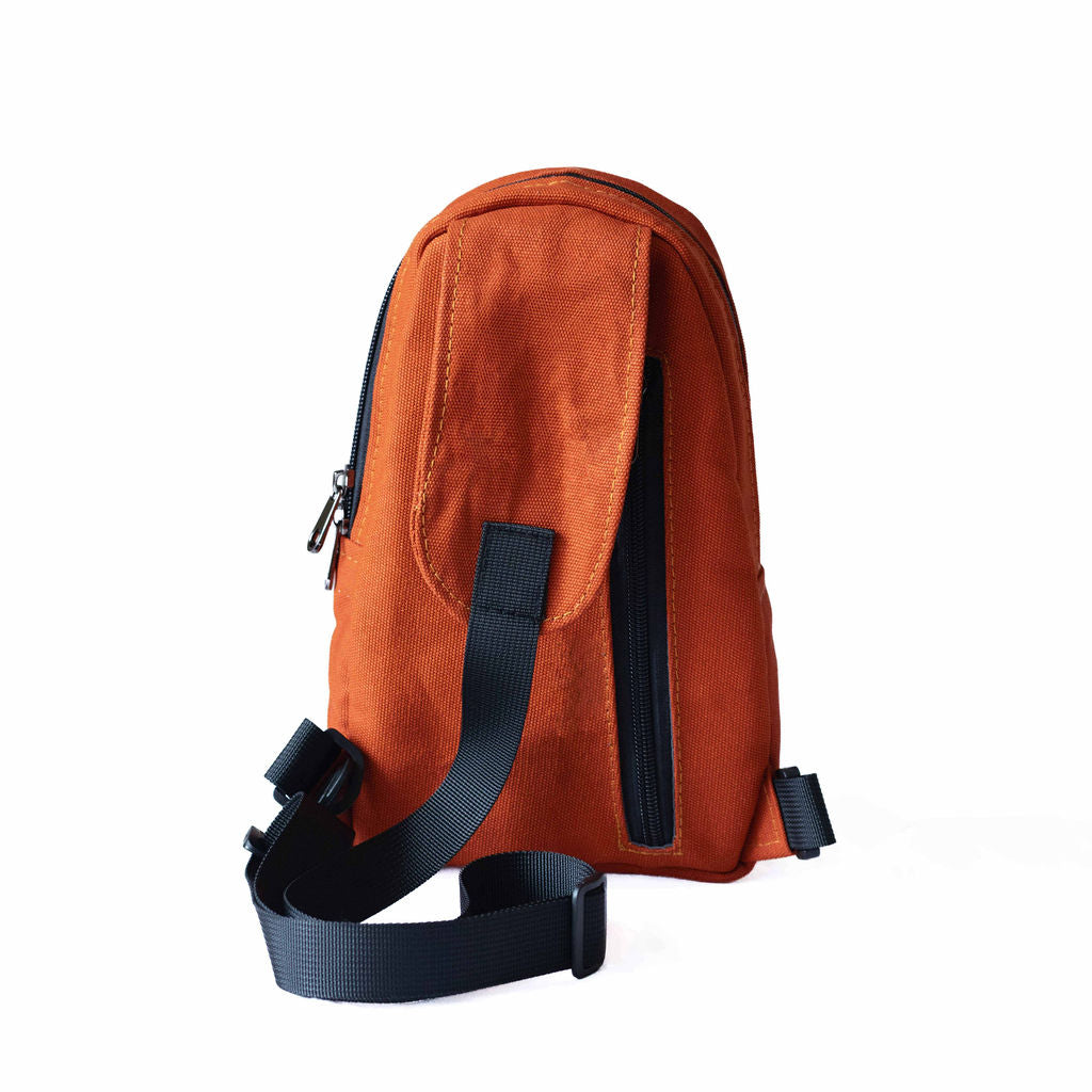 Buru canvas sling bag in rust — sustainable handmade crossbody #color_rust