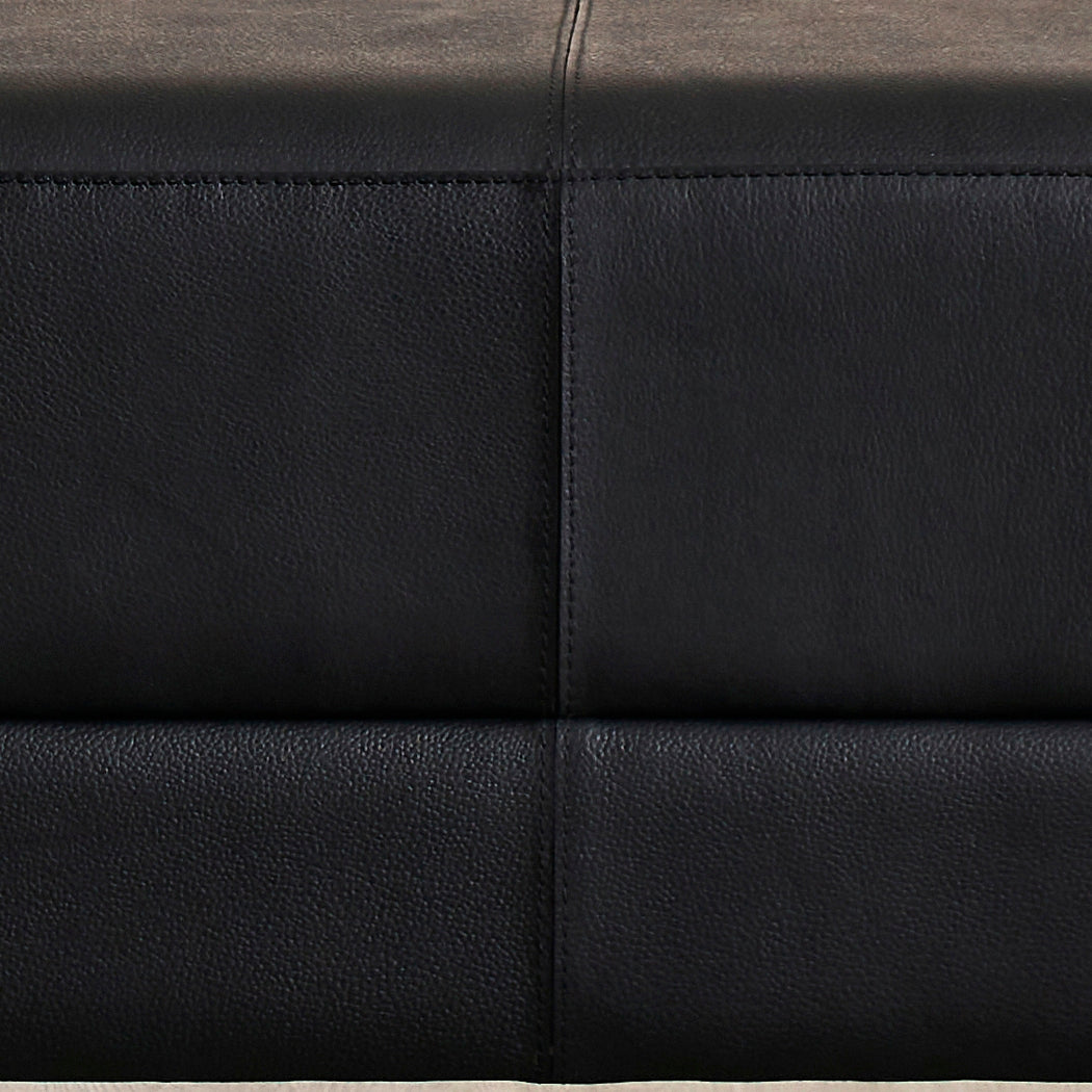 FN-5200-642033_9|Detail shot of the exquisite black leather upholstery on furniture, showcasing fine grain texture and precise stitching.