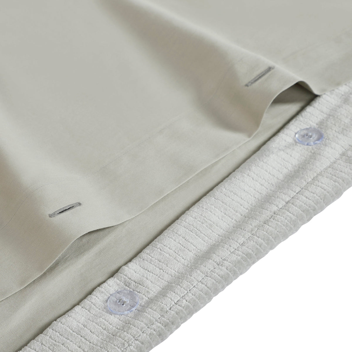DT-054-10692_8|Close-up of light green ribbed velvet duvet cover with secure button closure, showcasing reversible fabric details.