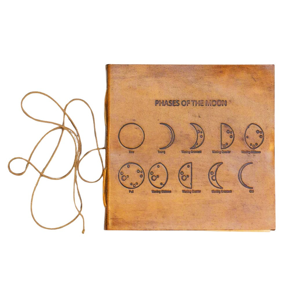 Soothi leather journal embossed with moon phases – celestial-inspired, handcrafted notebook for lunar journaling, intention setting, and spiritual reflection