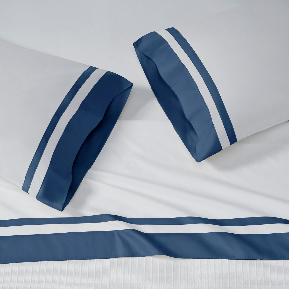AKP-543-2040_2|Two standard pillowcases and a flat sheet with double stripe beige embroidered borders, 100% cotton sateen weave.