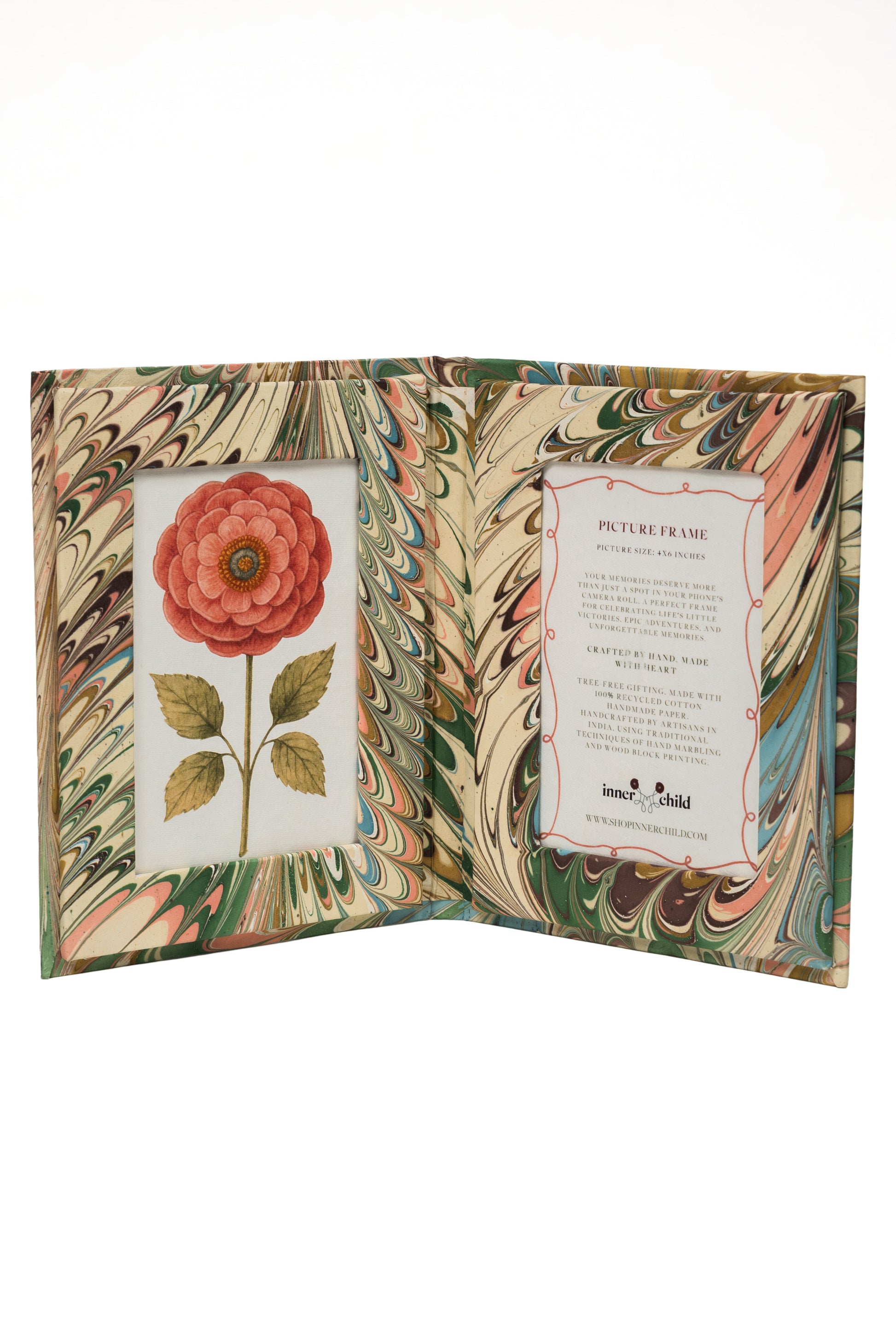 Open hand-marbled folding picture frame book from Inner Child with flower illustration