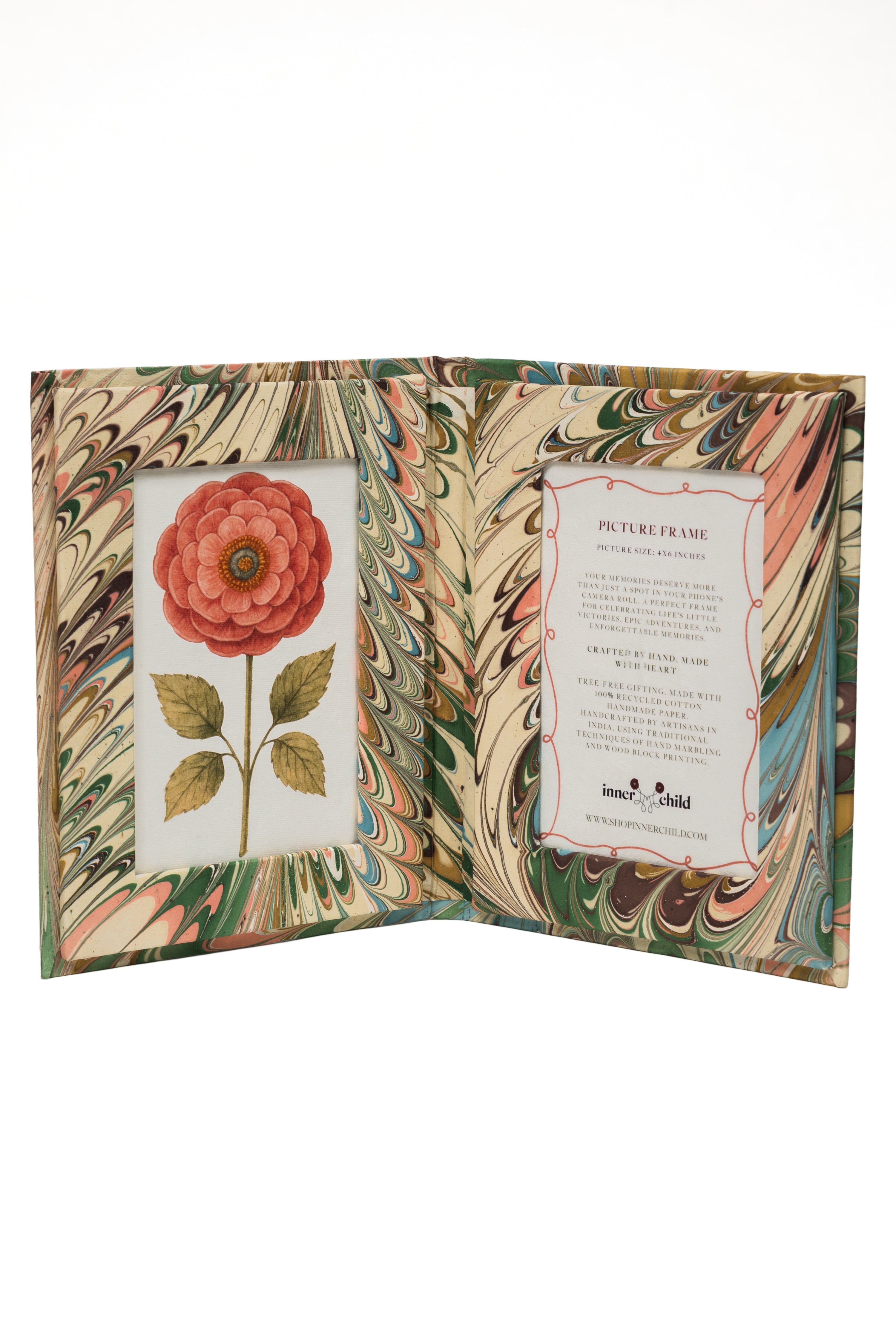 Open hand-marbled folding picture frame book from Inner Child with flower illustration