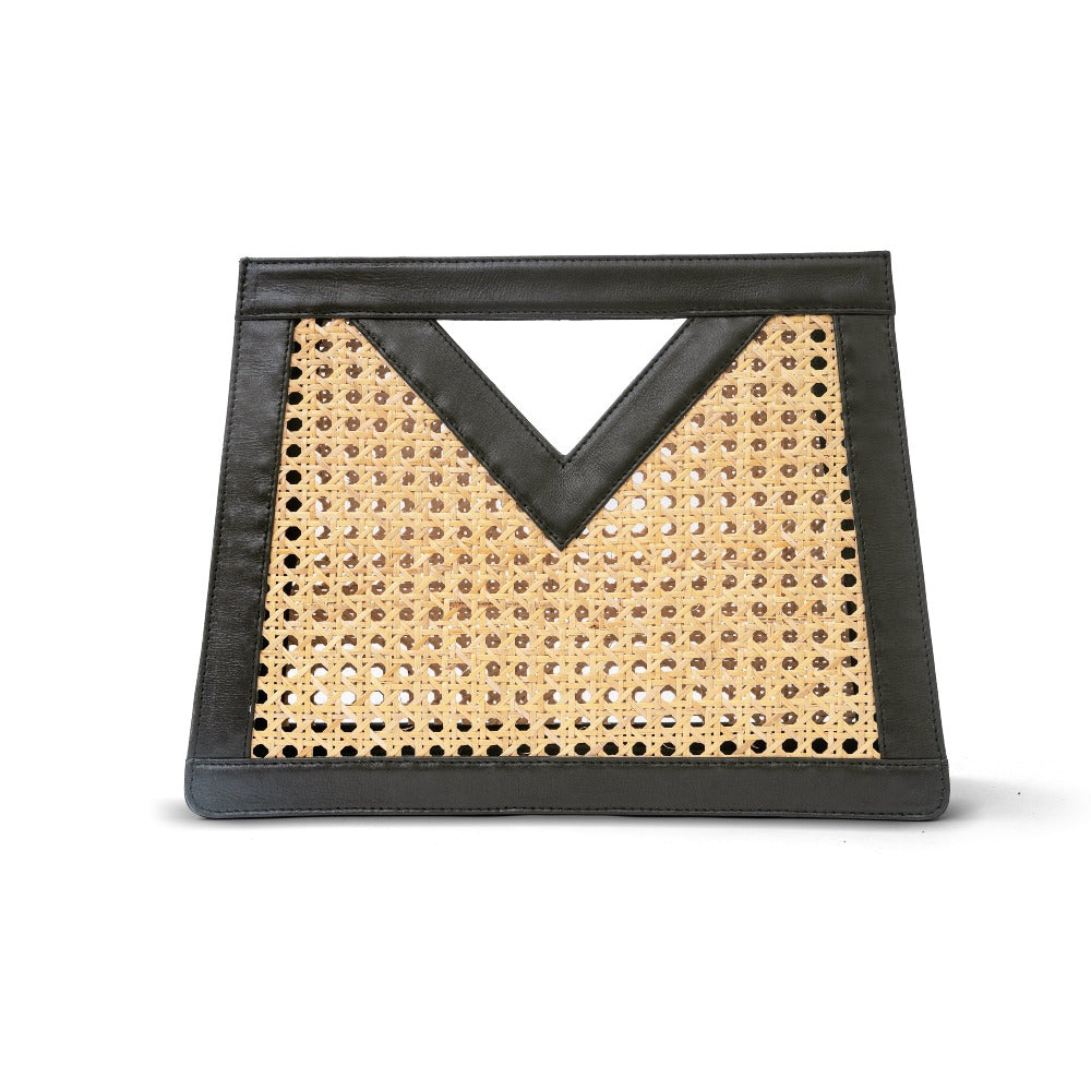 Tan Leather Trim and Rattan Cane Open Weave Top Handle Tote Handbag by the poolside