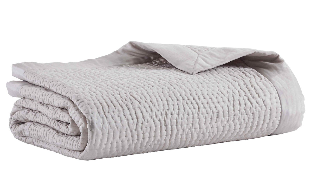 CL-197-11096_5|Neatly folded light grey quilted coverlet, featuring a distinctive waffle texture, offering soft and versatile bedding.