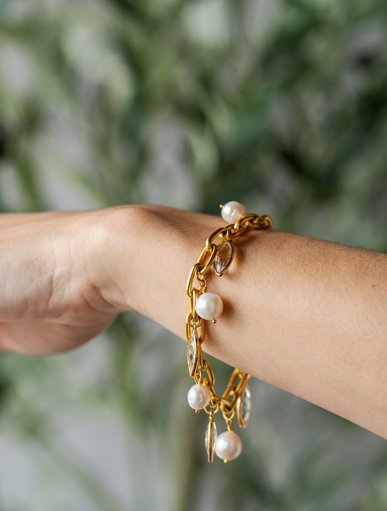 Gold chain bracelet with Edison pearl and marquise-cut crystal charms, alternating along a chunky link design
