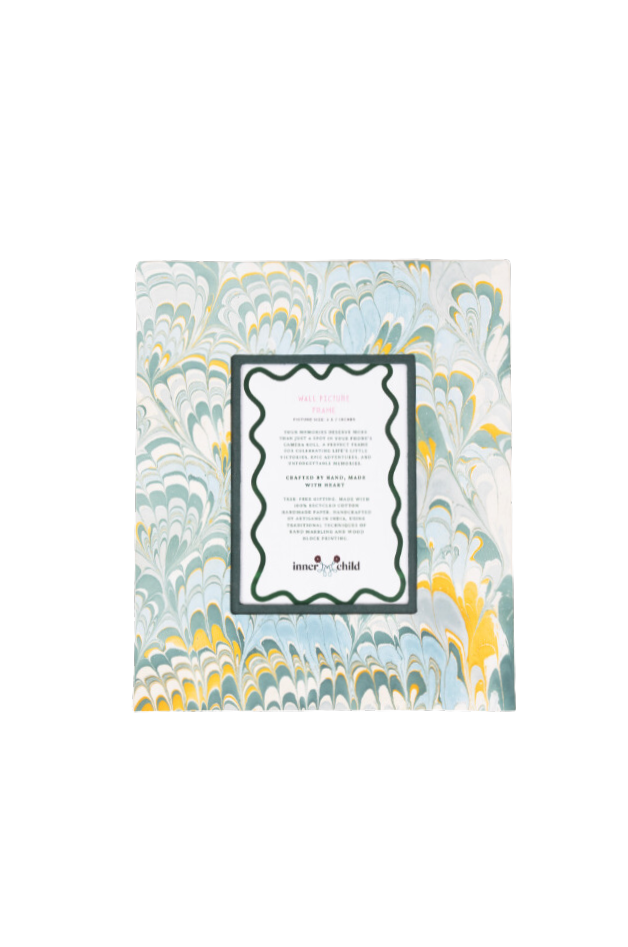 Top-down view of hand-marbled blue large wall picture frame (5x7),