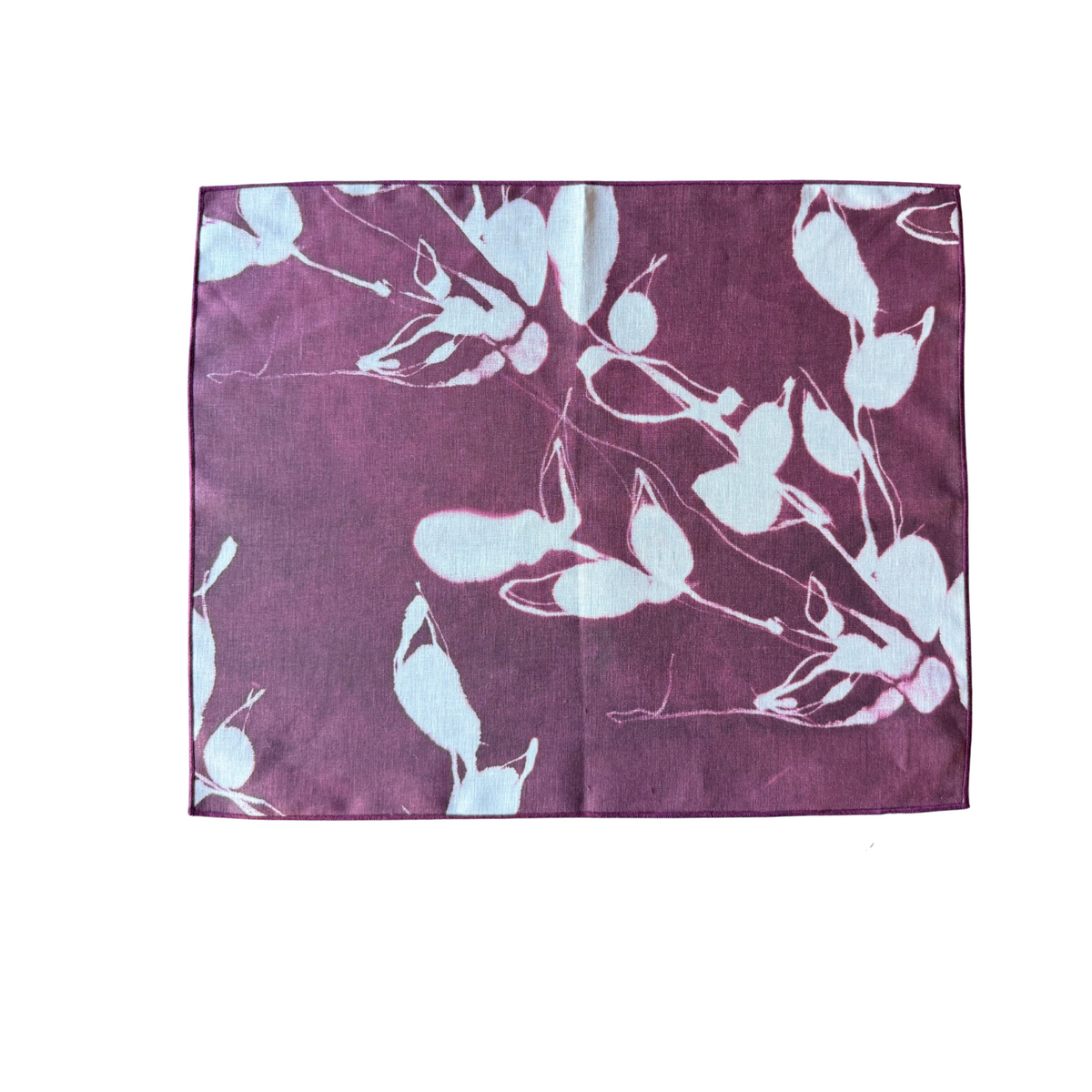 Porto Print Aubergine linen placemat styled on dining table - Goldie Home