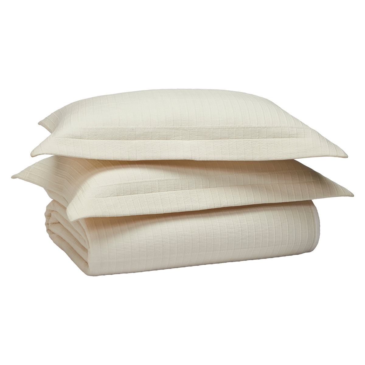 CL-271-11096_13|Stacked cream textured coverlet and two matching pillow shams with ribbed pattern, creating a complete and cozy bedding set.