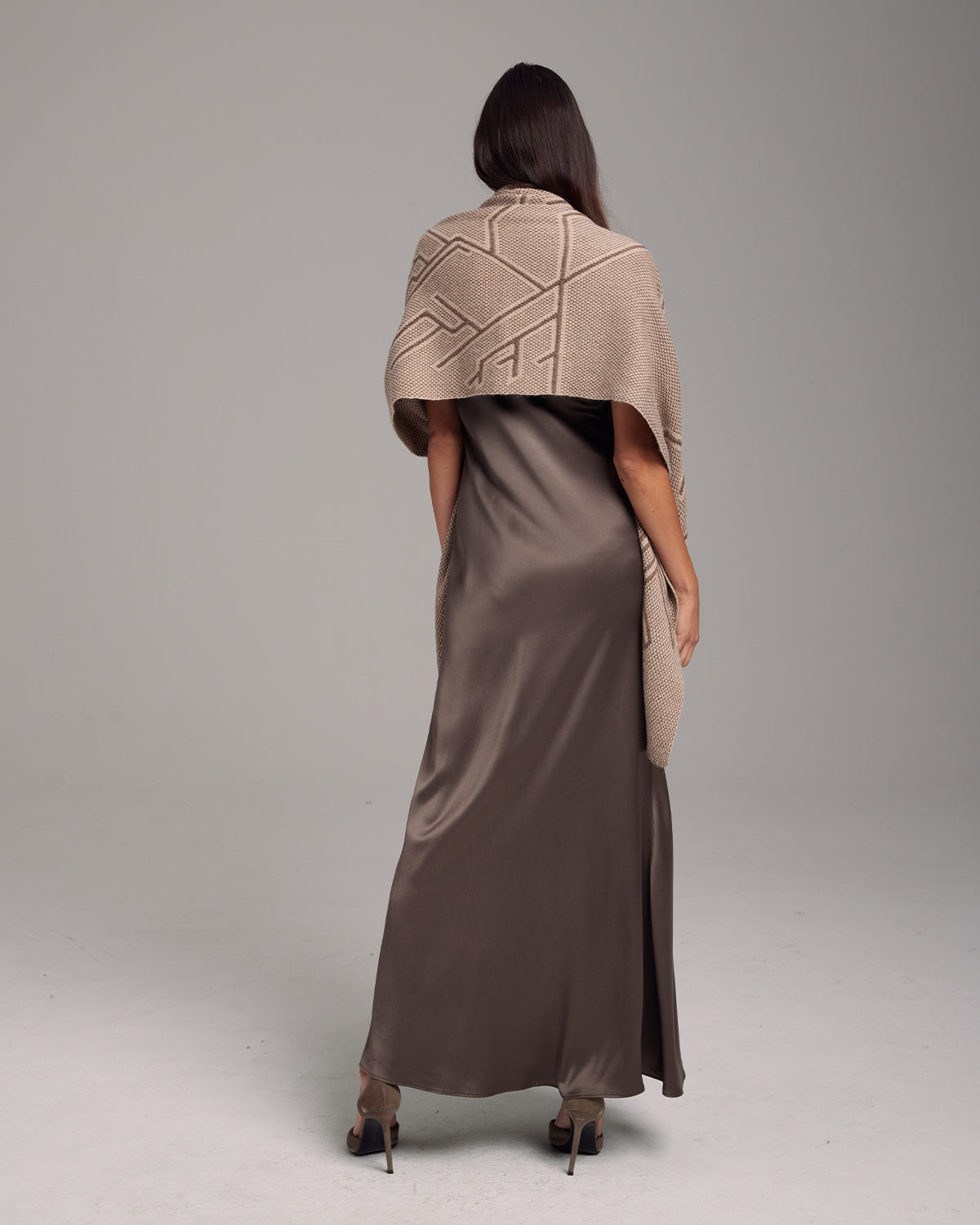 Model wearing Raiz Shawl in Baby Alpaca, showcasing its design and texture.