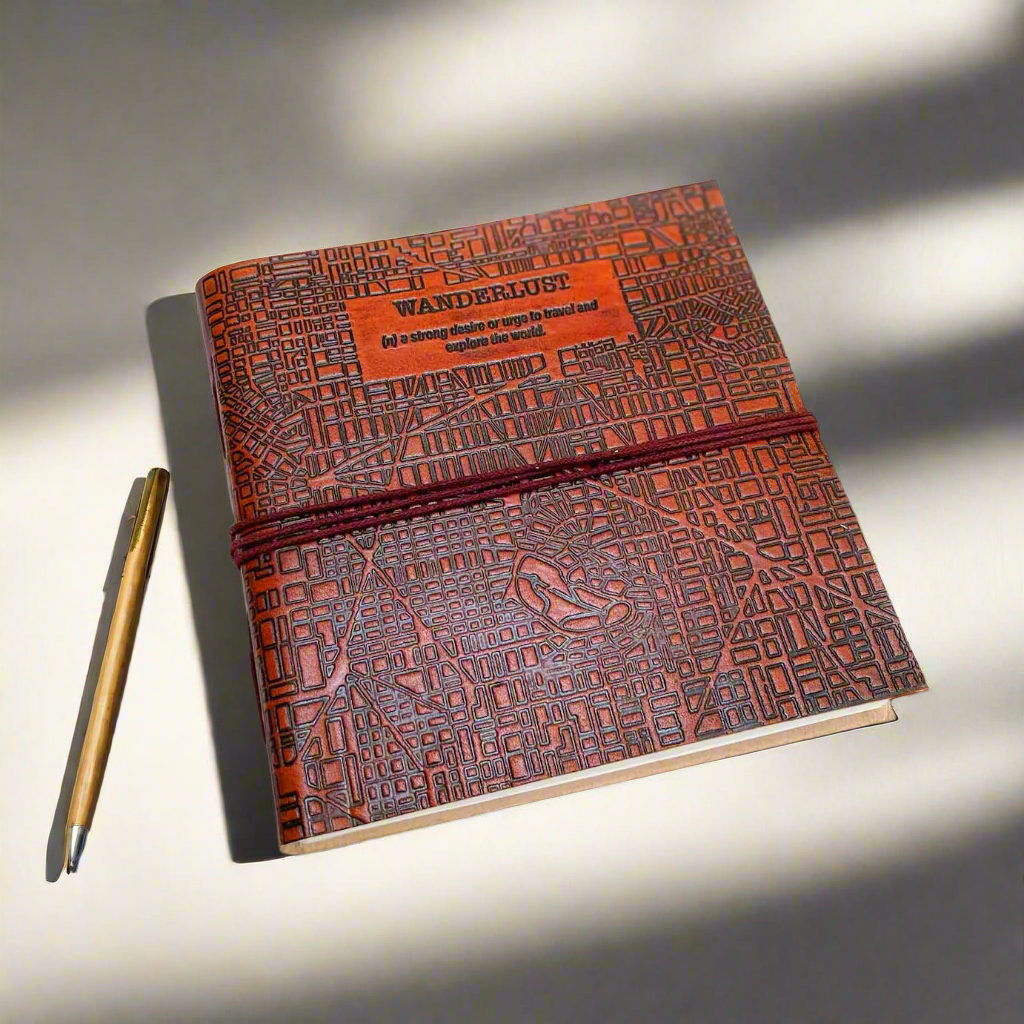 Leather journal with “Wanderlust” engraving – travel-inspired, handcrafted notebook for writing, sketching, and adventure journaling