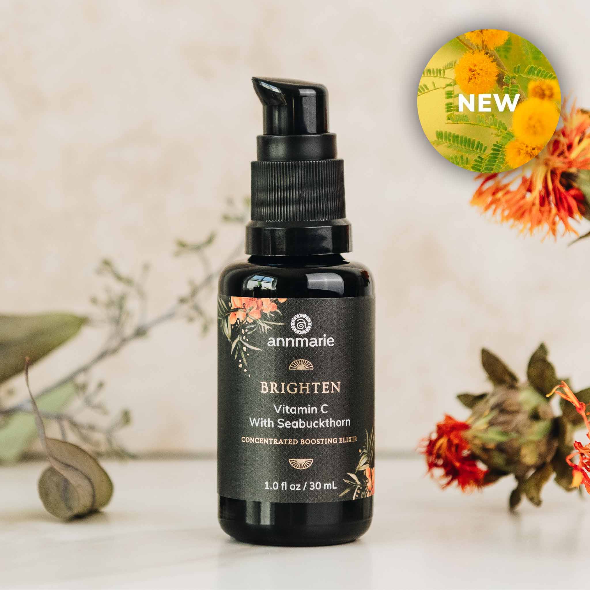 Brighten Vitamin C with Seabuckthorn concentrated boosting elixir bottle displayed with botanical elements and a “New” product badge