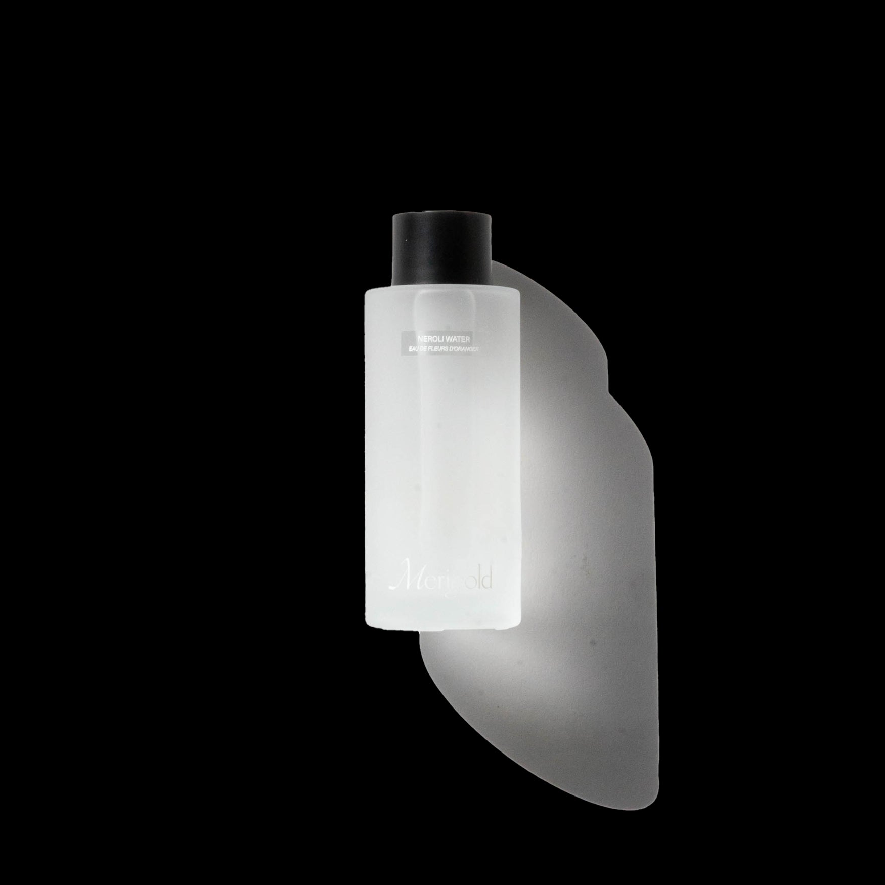 Merigold Neroli Water (orange blossom water) in frosted glass bottle – hydrating, balancing floral water toner for normal, oily, or sensitive skin. Clean botanical skincare for daily rituals.