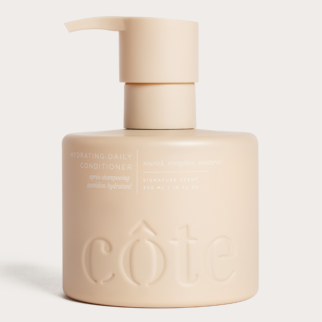 Bottle of Côte Beauty Hydrating Daily Conditioner Non-Toxic Hair Conditioner.