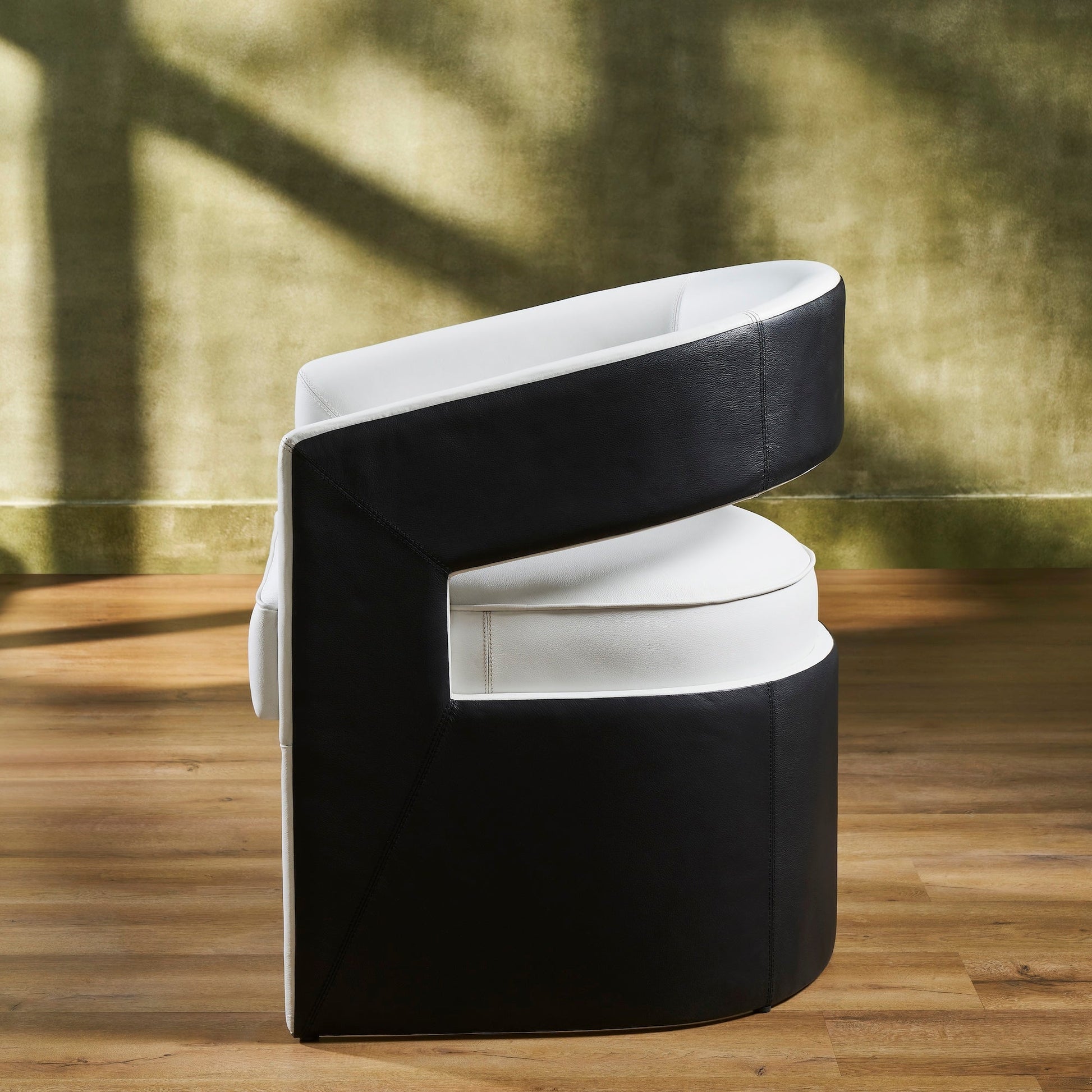 FN-5208-282429_4|Modern white and black genuine leather accent chair, showcasing a unique angular profile. Premium quality leather furniture for luxury.