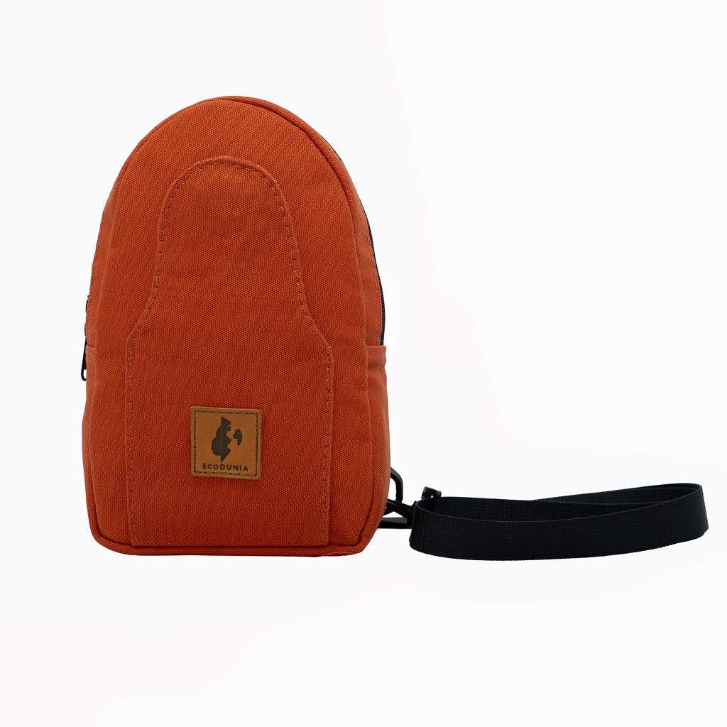 Buru canvas sling bag in rust — sustainable handmade crossbody #color_rust