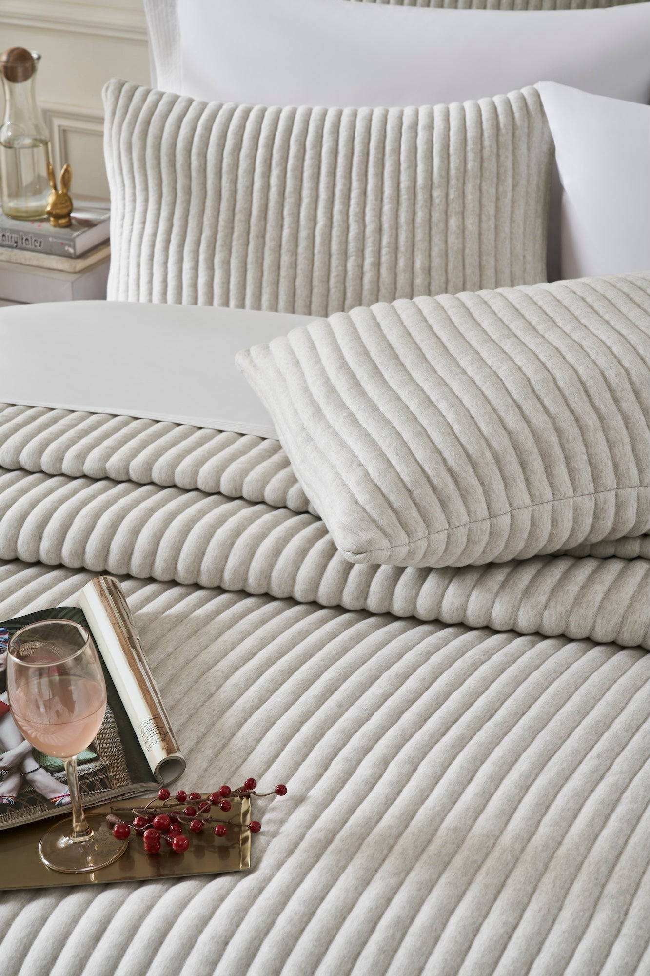 QT-375-9496_4|Soft light grey ribbed quilt and matching pillow shams, providing cozy comfort for a modern bedroom aesthetic.