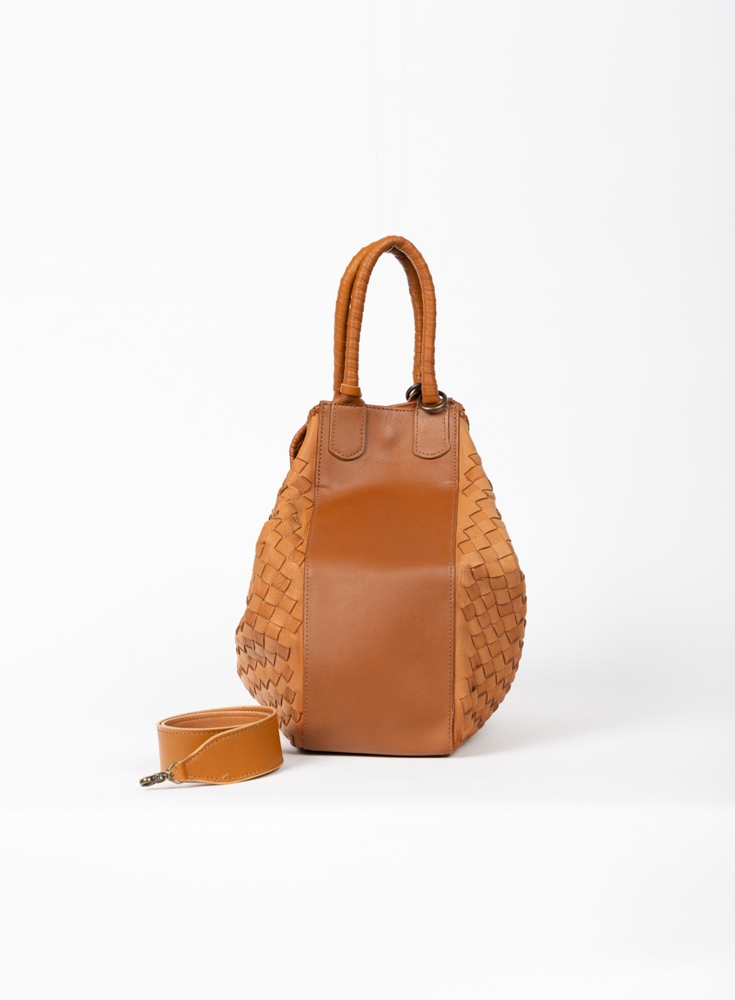 all day leather tote in camel from our fall collection showcased by a model front view.