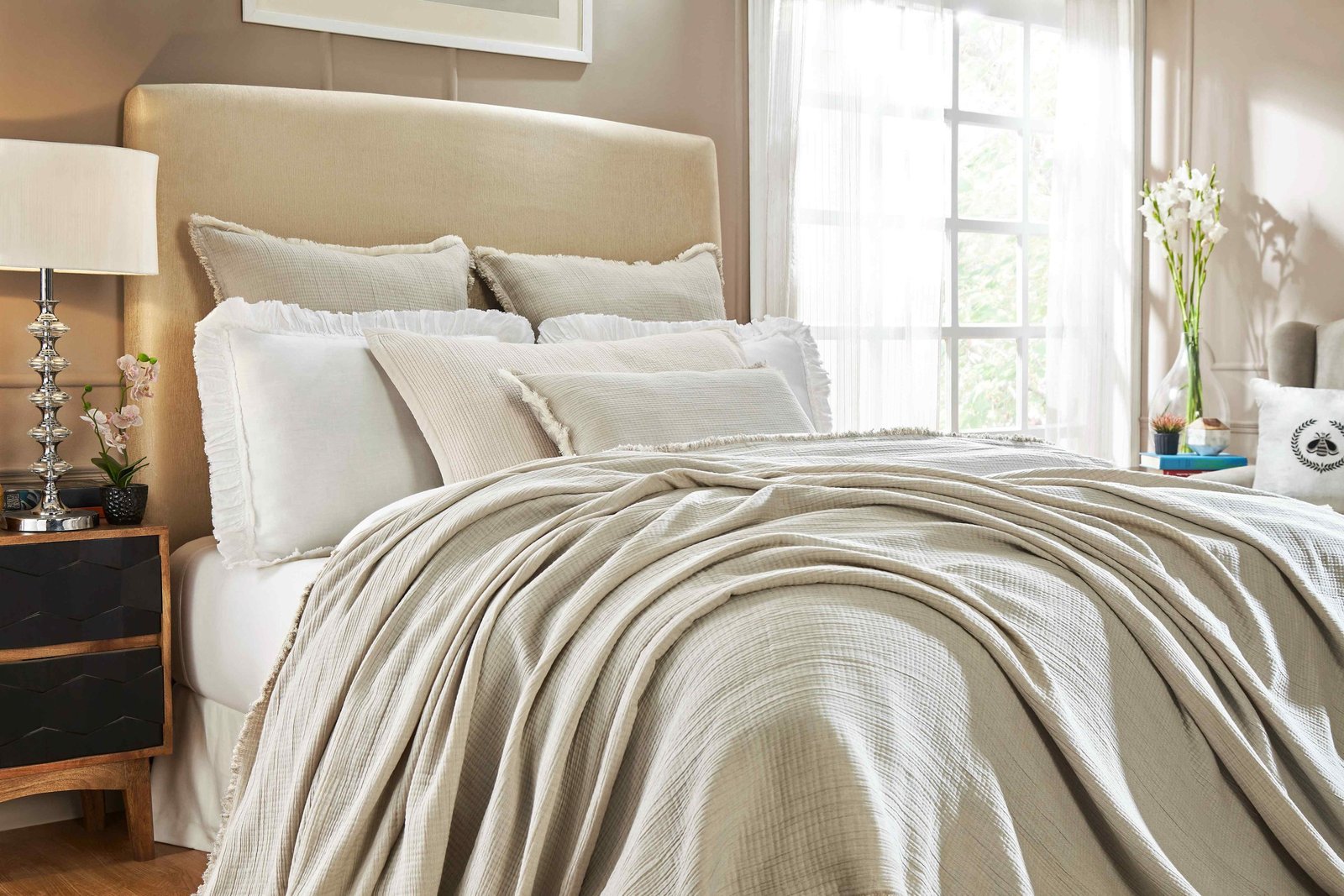 BT-102-9496_3|Elegant light grey textured blanket draped gracefully over a bed, creating a serene and sophisticated bedroom ambiance.