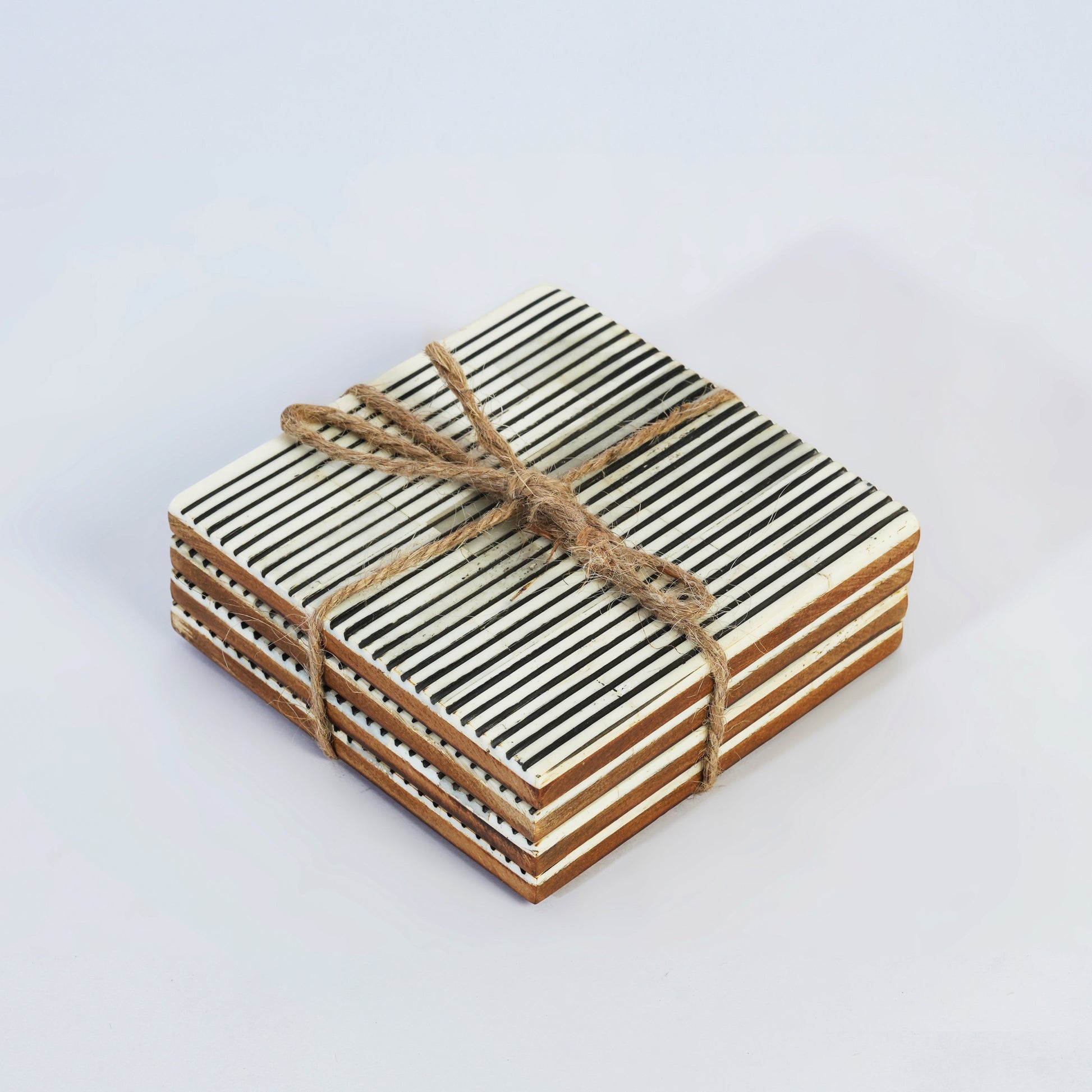 Pinstripe bone inlay coaster set with black and grey stripes