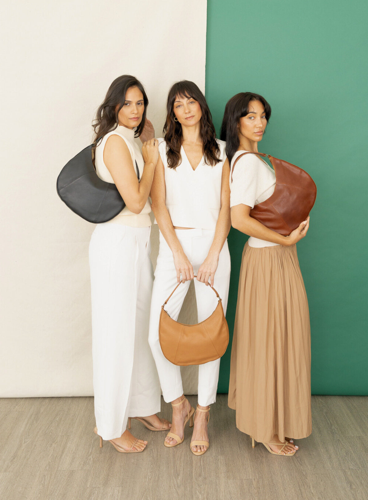 saddle shoulder bag from womens bags in brown showcasing exterior view.