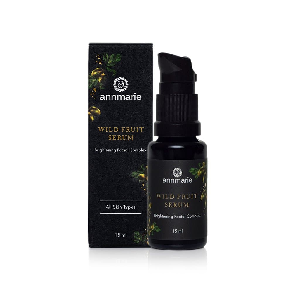 Wild Fruit Serum brightening facial complex bottle with product box packaging for all skin types.