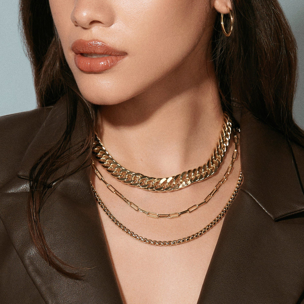 Arya Necklace with layered gold necklaces perfect for any vibe