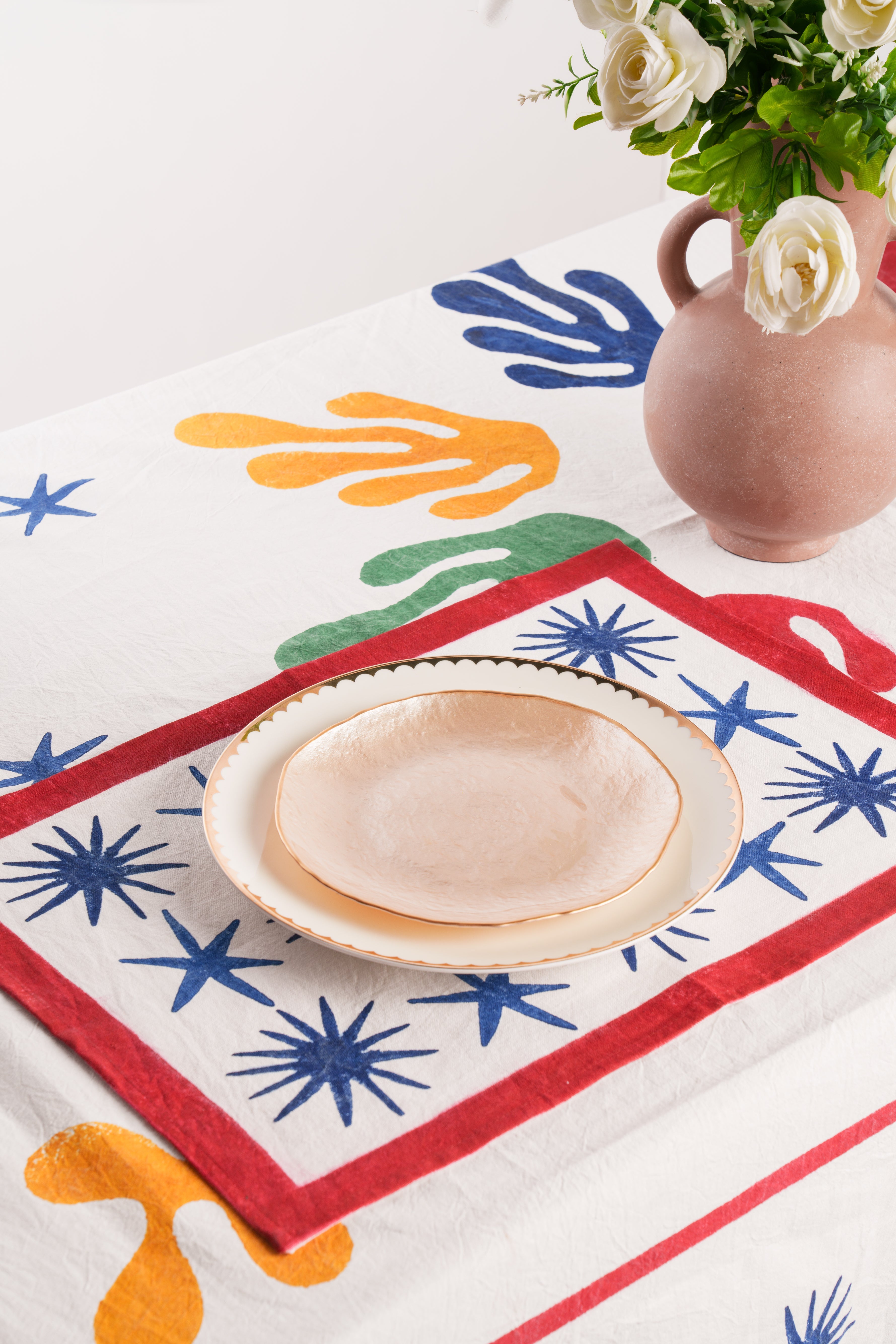 Inner Child Celestial Matisse blockprint placemat with colorful handprint designs