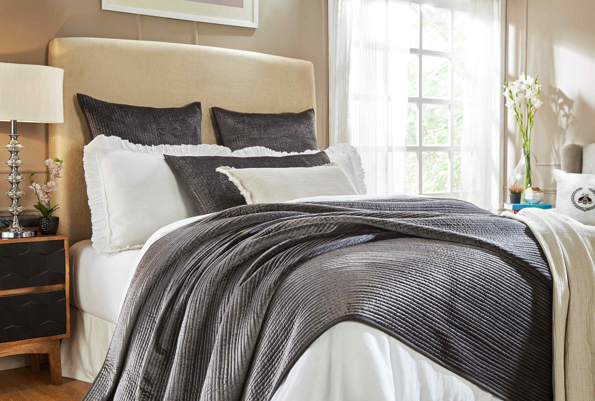 CL-153-11096_2|Luxurious charcoal grey velvet ribbed coverlet with intricate braided texture, adding refined comfort to the bedroom setting.