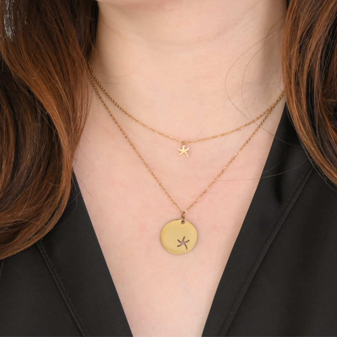 Model photo of gold necklace set, starfish shaped necklace, gold ocean jewelry, 14k plated gold, popular jewelry brands