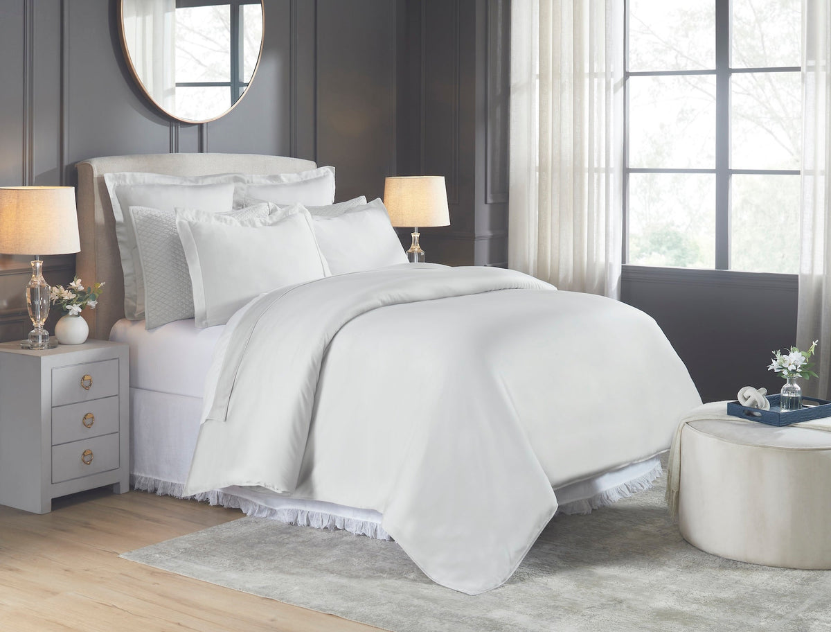 DT-047-9092_2|Luxurious white duvet cover draped elegantly on a bed in a bright, modern bedroom, enhancing any decor.
