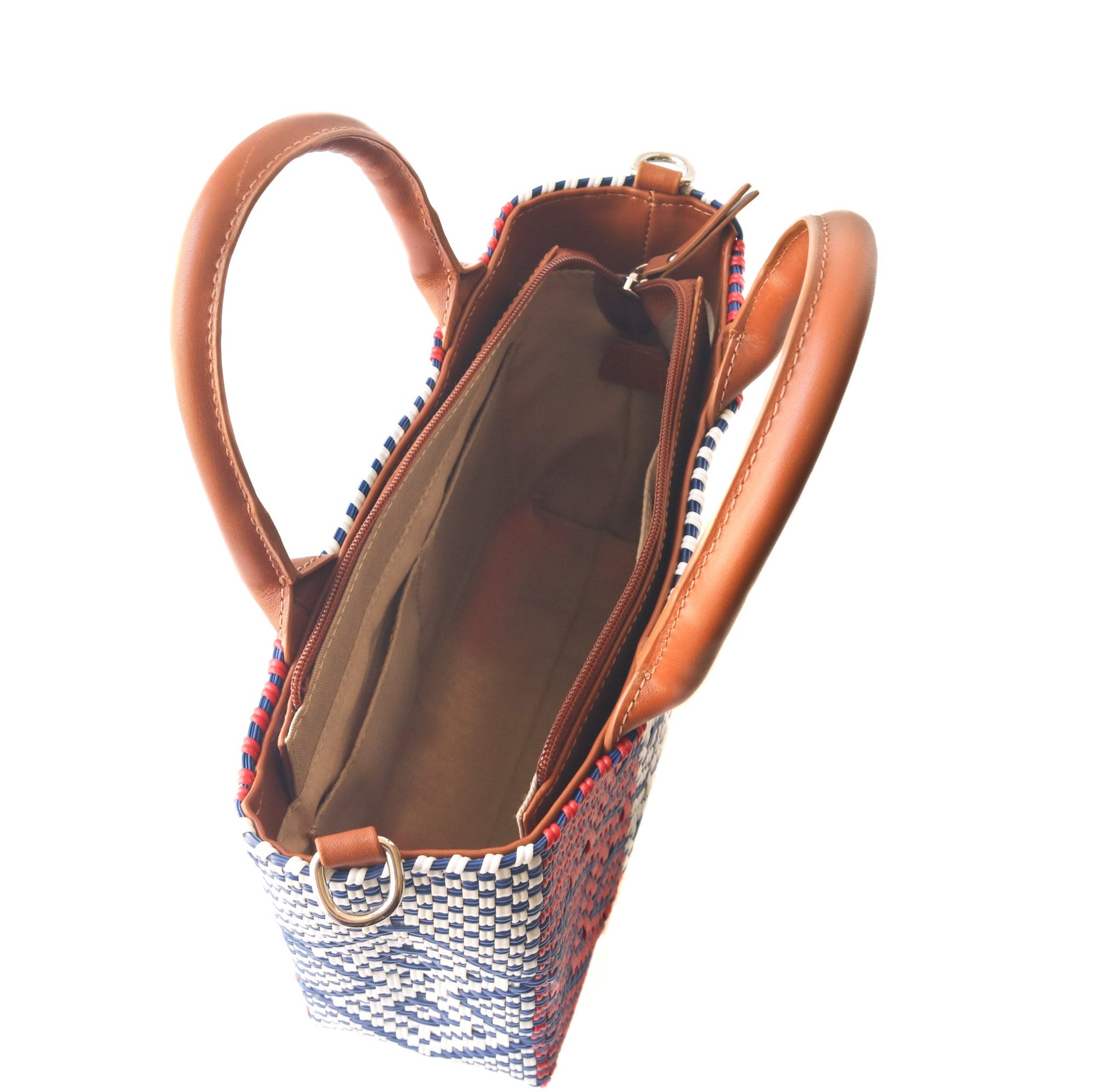 Piruli Small Woven Crossbody Bag in red, white, and blue, with a camel leather shoulder strap, handles, and pouch - Camel Leather - Tin Marin Brand - Small Crossbody bags for women - handwoven bags made by artisan communities