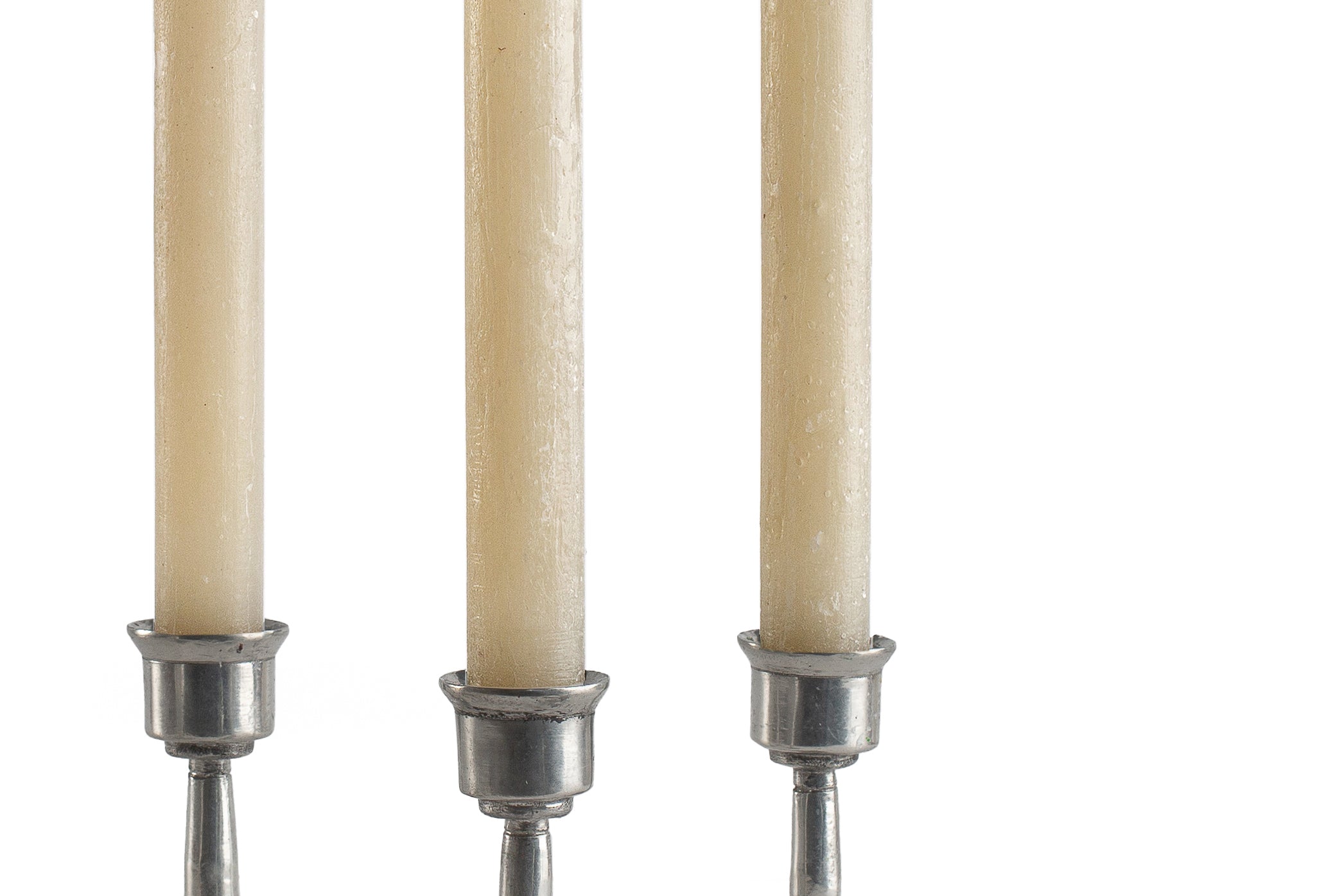 Close up of 3 sand frosted Luma Afrika tapers to show the 'frosted' finish