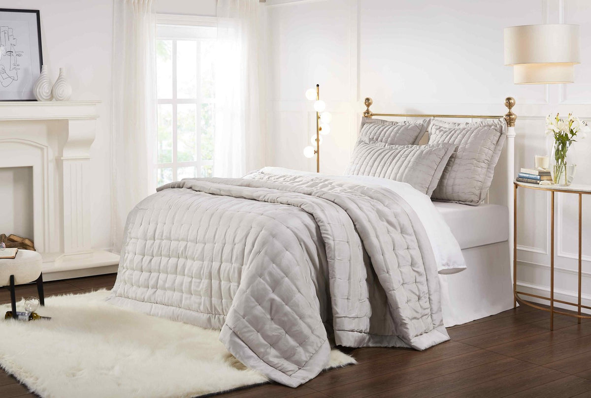 QT-334-11096_4|Elegant bedroom scene featuring a draped light grey square-quilted quilt for sophisticated warmth and comfort.