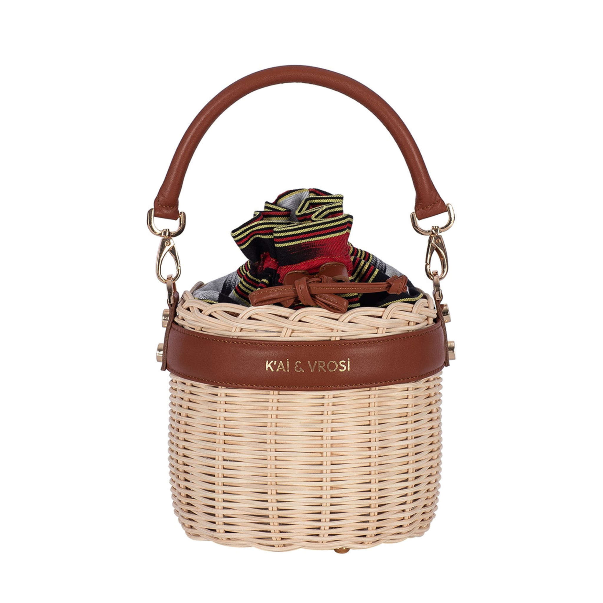 Okordule brown, round shaped woven rattan handbag with leather top handle. drawstring at the top.