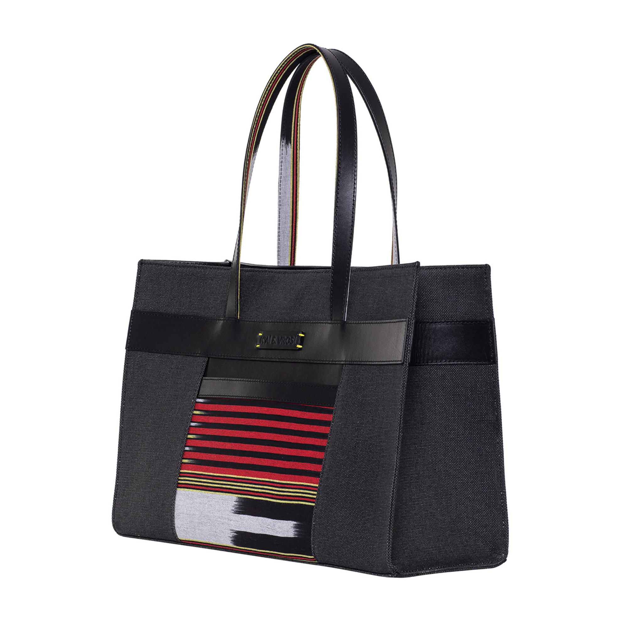 The inside of Zua black tote bag. A long strap for keys or wallets and zipped large pocket