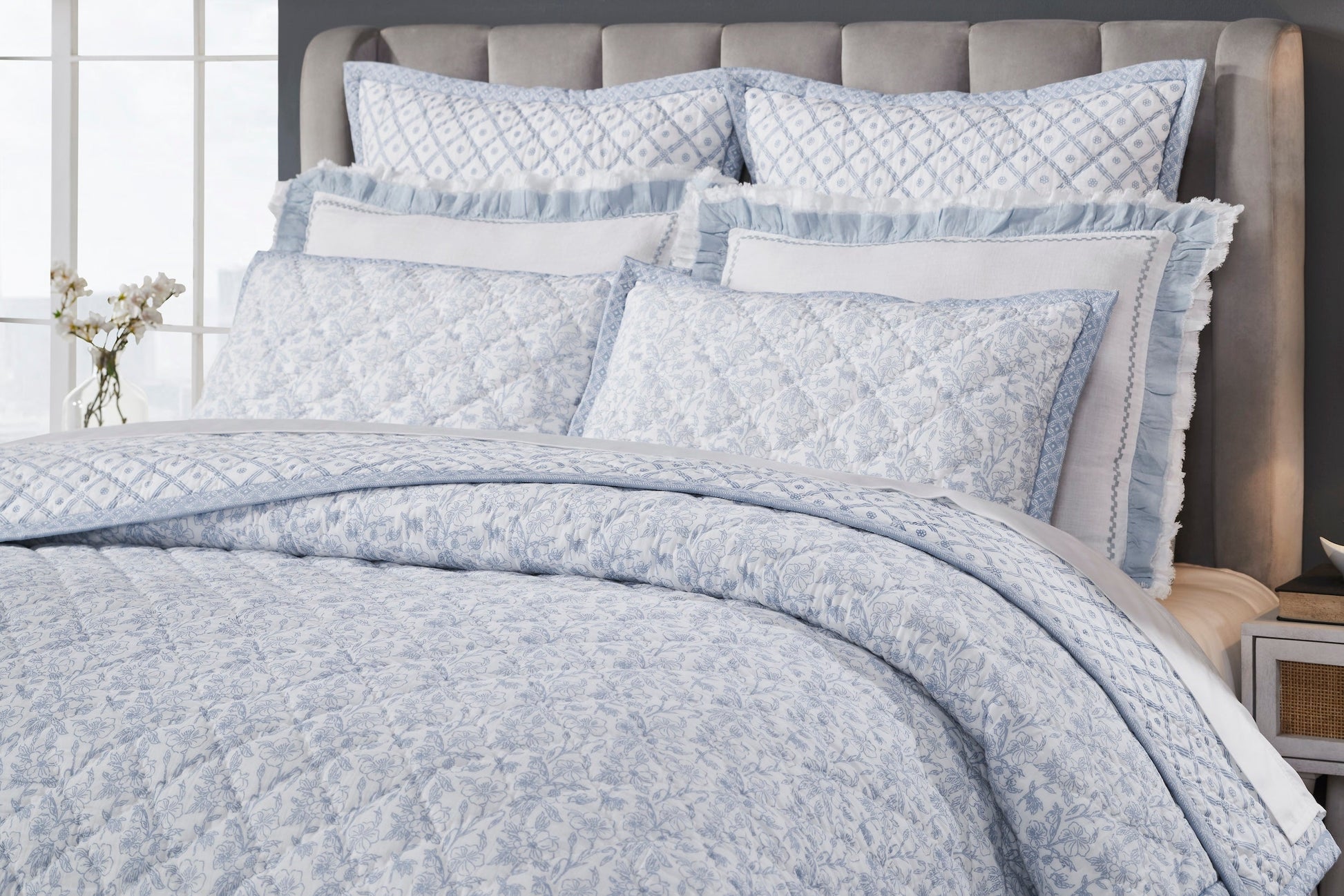 QT-345-11096_3|Close-up of light blue floral patterned quilt with diamond stitching, ideal for a serene bedroom decor.