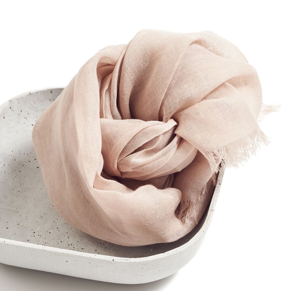 Oat Beige Neutral Hand Woven Soft Linen Silk Scarf displayed in a simple modern bowl.