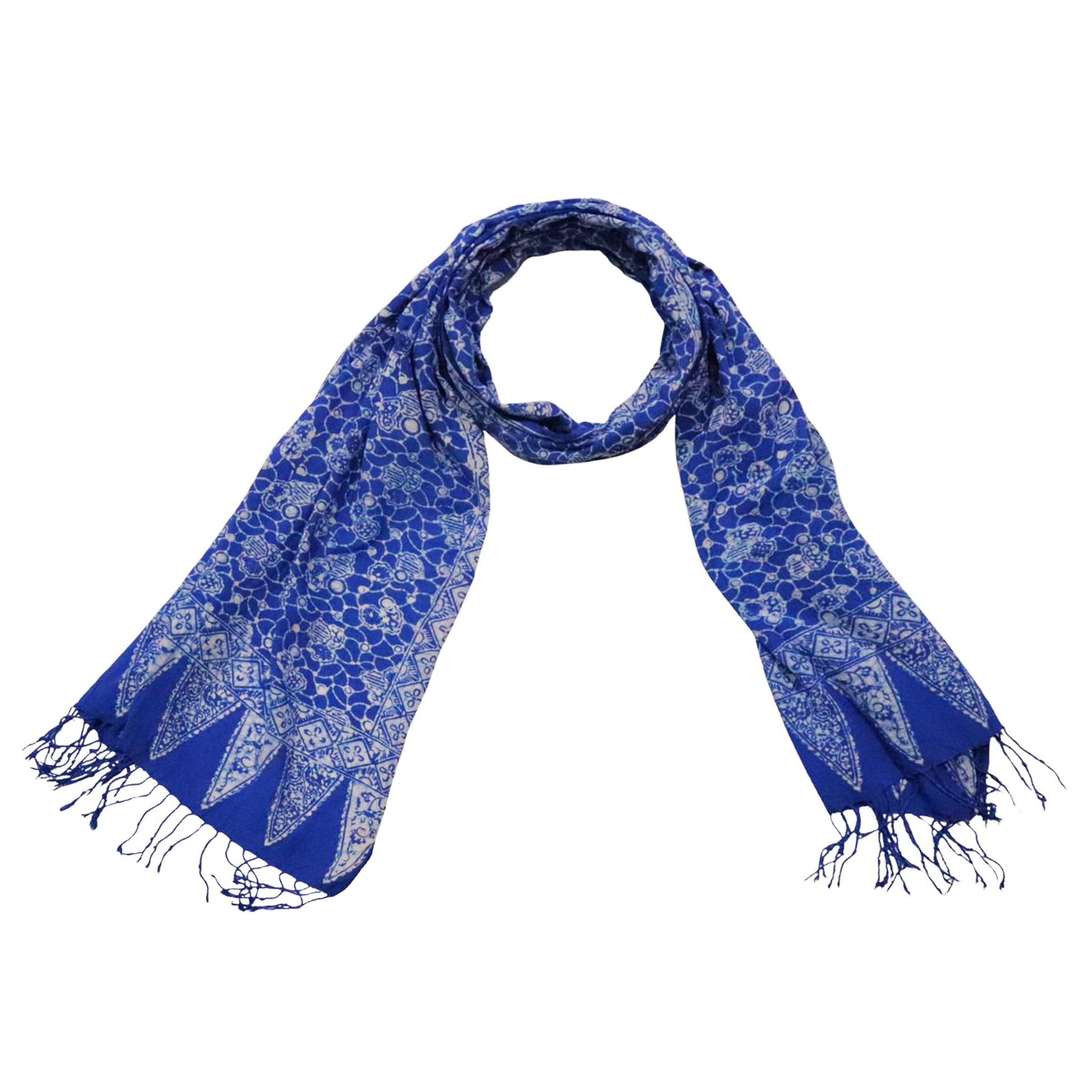 Blue patterned scarf with tassels on a white background