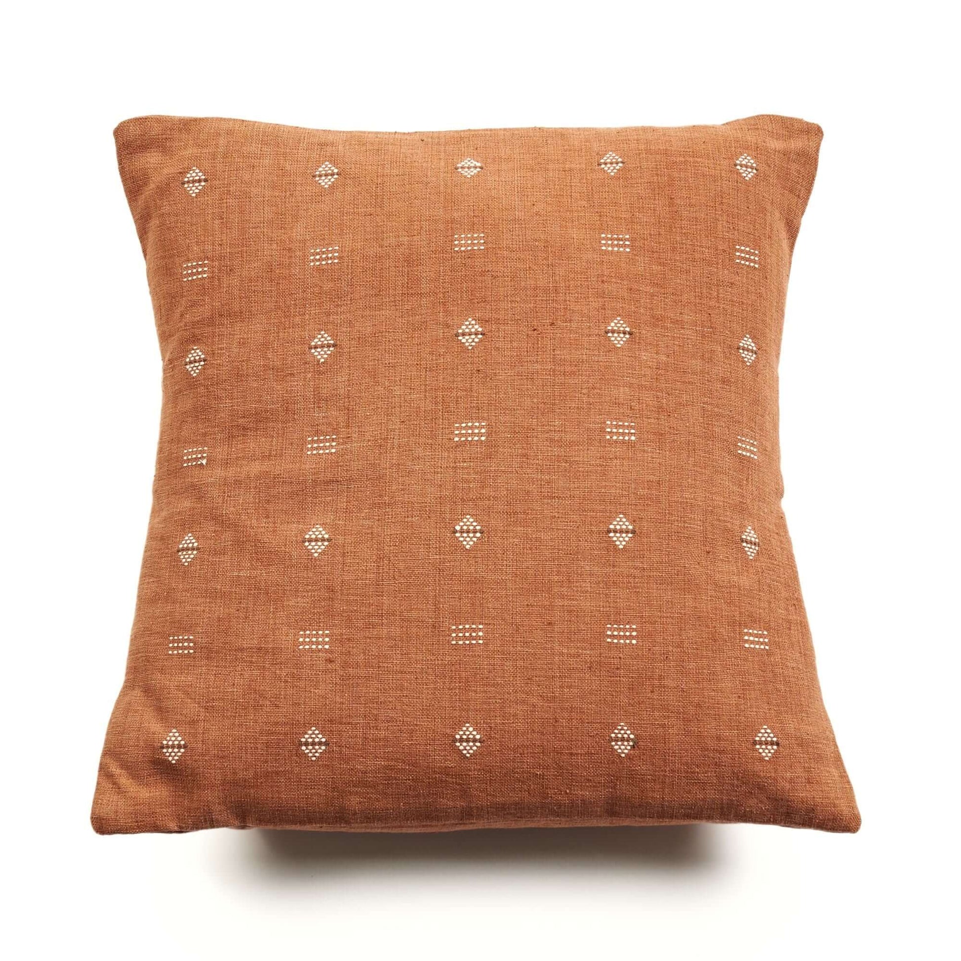 Nira Ochre Hand Spun Organic Cotton Handloom Pillow featuring classic pattern and undyed yarn on ochre background.