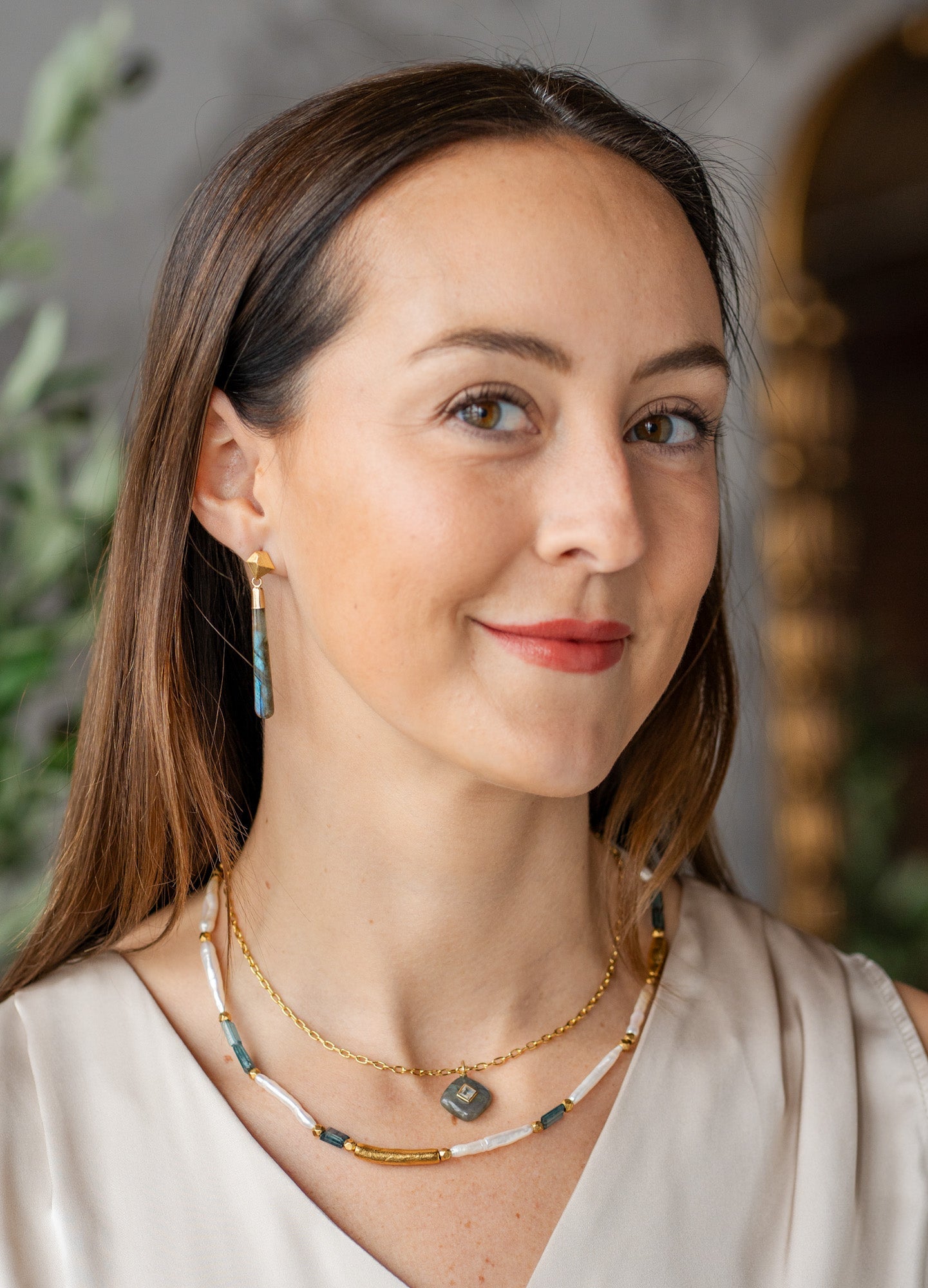 Long labradorite gemstone earrings with gold faceted post and tapered iridescent drops
