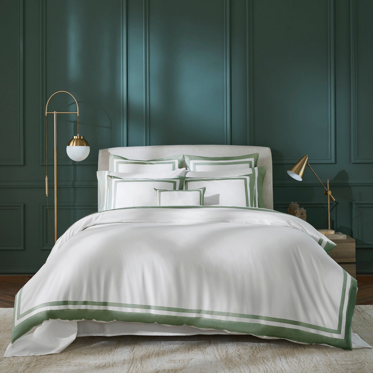 DT-069-X_2|White duvet cover with green double stripe border, paired with matching pillows in a modern bedroom setting. Luxurious and inviting bedding set.