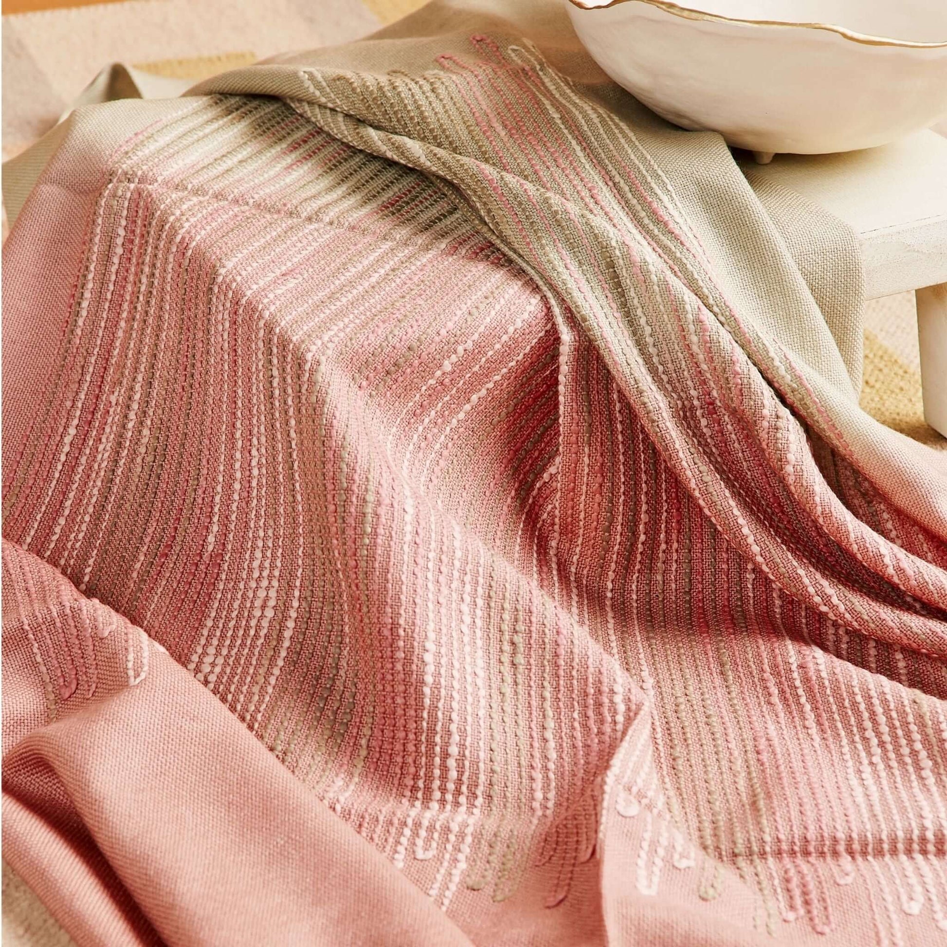Chive Pink Green Ombre Handloom Merino Throw displayed elegantly, showcasing its unique colors and hand-embroidered detail.